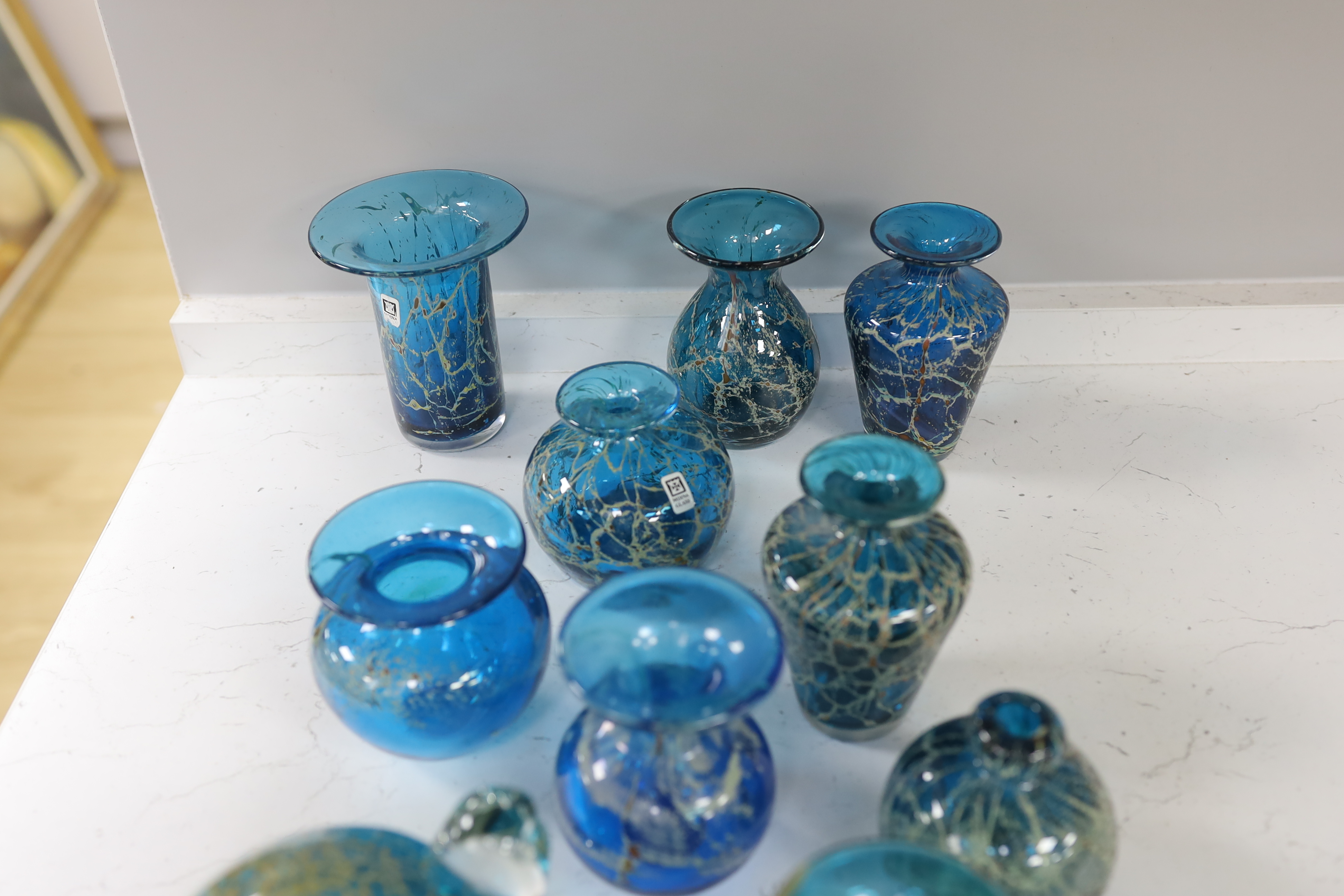 A collection of twenty five Mdina glass vases, bottles and ornaments, sea and sand colour